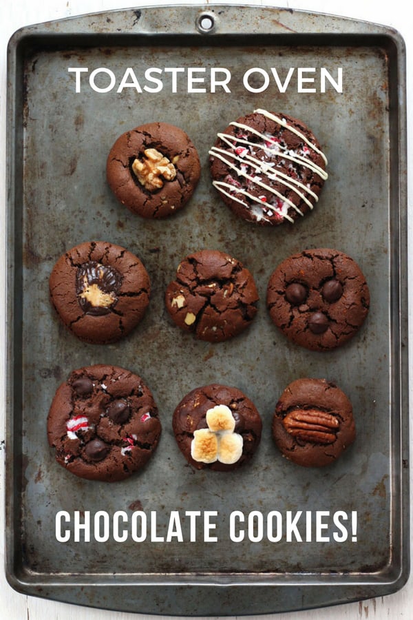 Toaster oven chocolate cookies in eight flavors on a baking sheet.