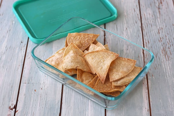 Leftover chips in a glass container.