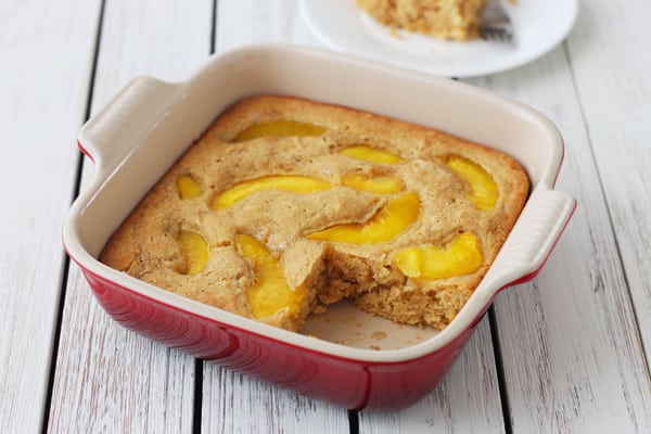 Baked pancake in a red baking dish.