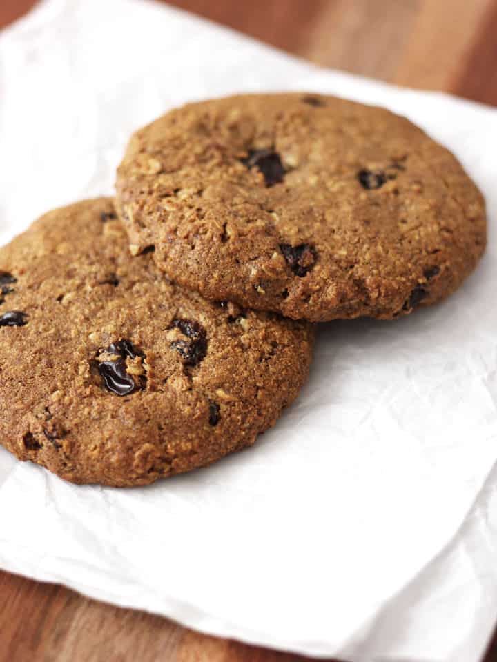 Large oatmeal cookies for two on a white napkin.