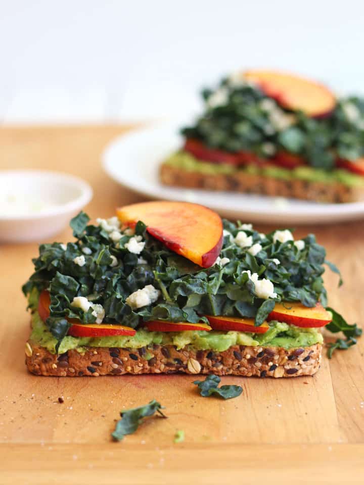 Avocado toast on a cutting board.