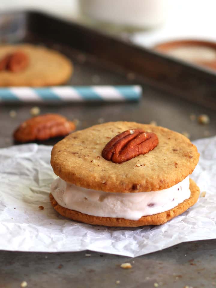 Mini ice cream sandwich on a piece of parchment.