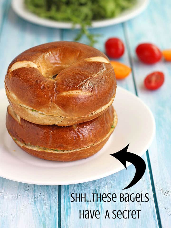 Stack of bagels with an arrow pointing with text 'these bagels have a secret'