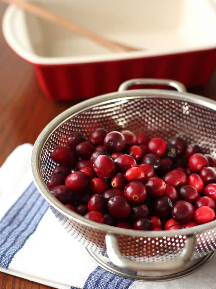 Colander of washed fresh cranberries.