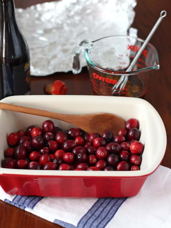 Fresh cranberries in a baking dish.