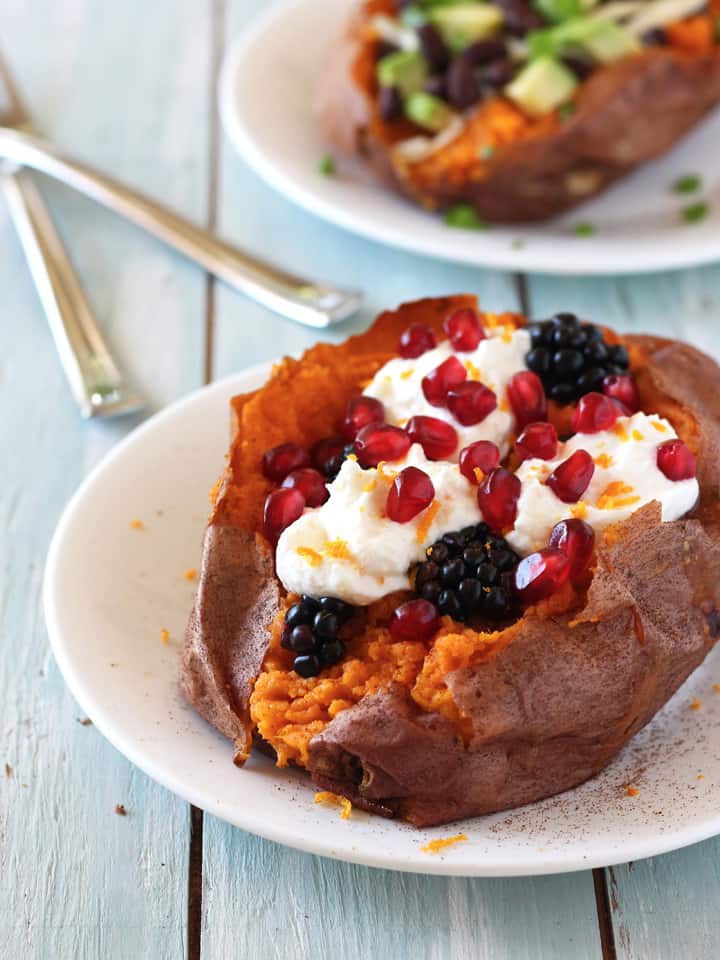 Baked sweet potato stuffed with ricotta and berries.