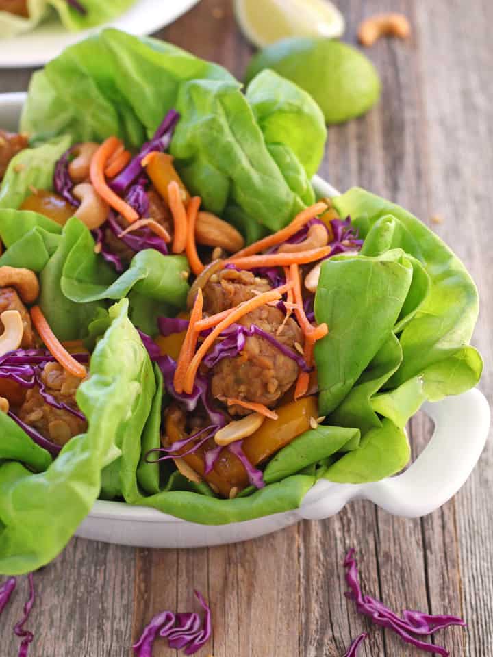 Lettuce leaves stuffed with marinated tempeh, veggies, and cashews.