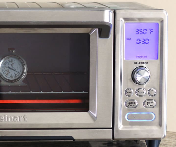 Closeup of control panel on a large toaster oven.