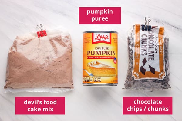 Half bag of cake mix, can of pumpkin, and bag of chocolate chunks.