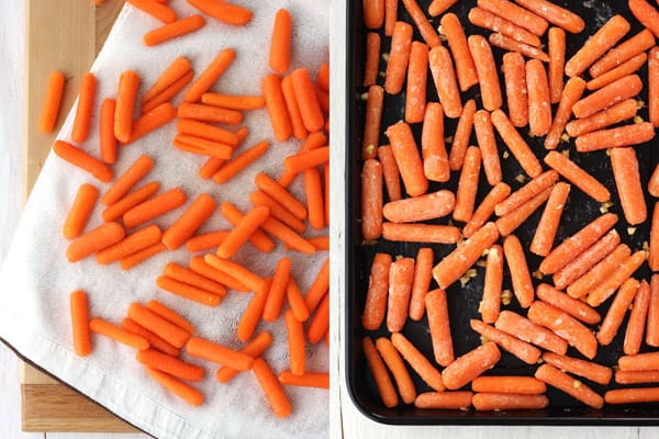 Baby carrots drying on a towel and in a roasting pan with oil.