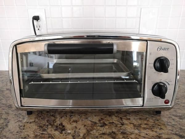 Small toaster oven on a kitchen counter.