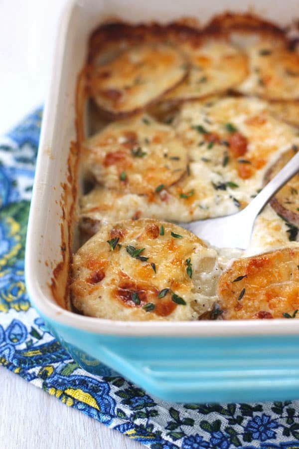 Pan of cheesy toaster oven baked potatoes au gratin