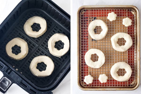 Raw biscuit donuts in air fryer basket and on cooking rack.