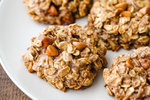 Closeup of butterscotch chips on a banana oatmeal cookie.