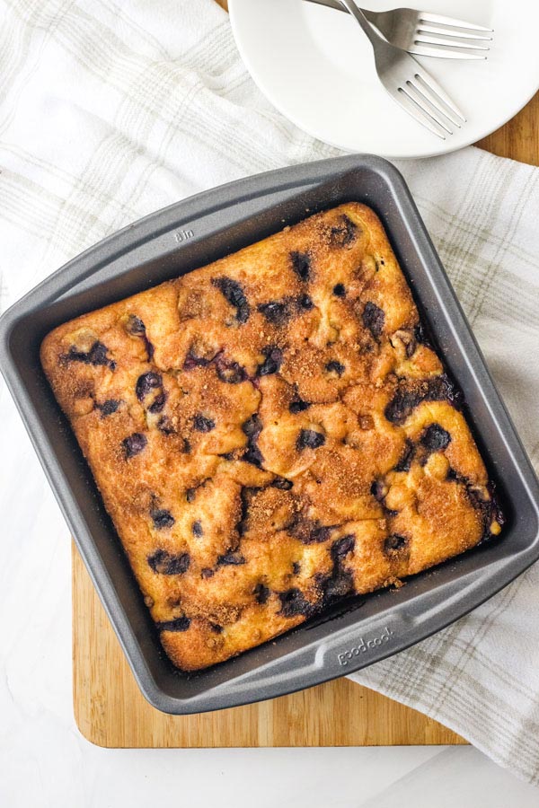 Overhead view of baked coffee cake in an 8x8 pan.