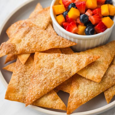 Cinnamon Baked Wonton Chips on a blue plate.