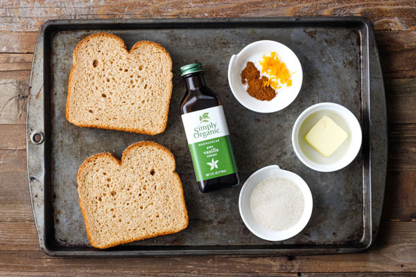 Cinnamon toast ingredients on a baking sheet.