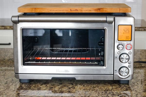 Convection countertop oven preheating.