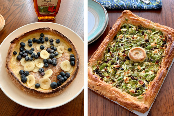 Dining room table with a dutch baby and puff pastry tart. 