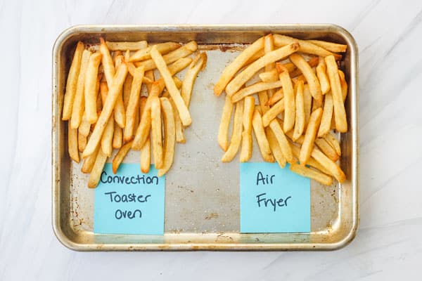 Golden air fried and convection baked fries on a sheet pan.