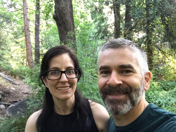 A couple in the forest.