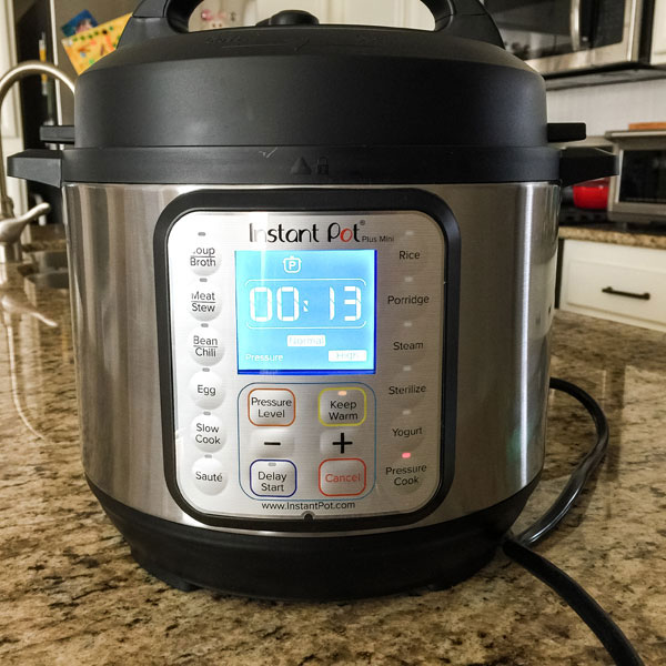 Instant pot mini on a kitchen counter.