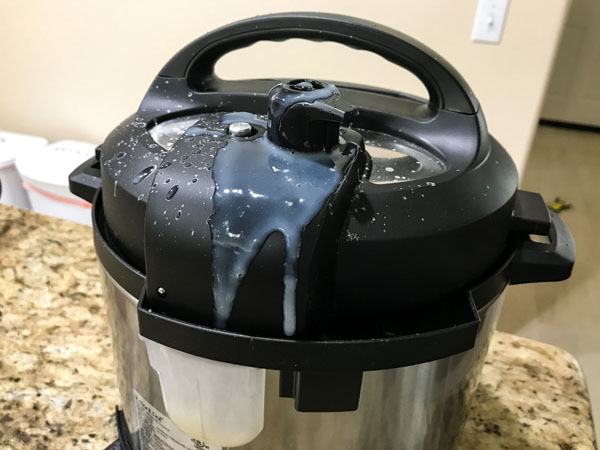Oatmeal pouring out of the release on an instant pot mini.