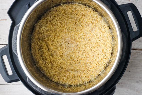 Cooked quinoa inside an Instant Pot.