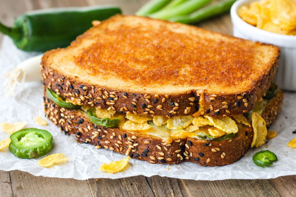 Jalapeno Popper Grilled Cheese on a piece of parchment paper.