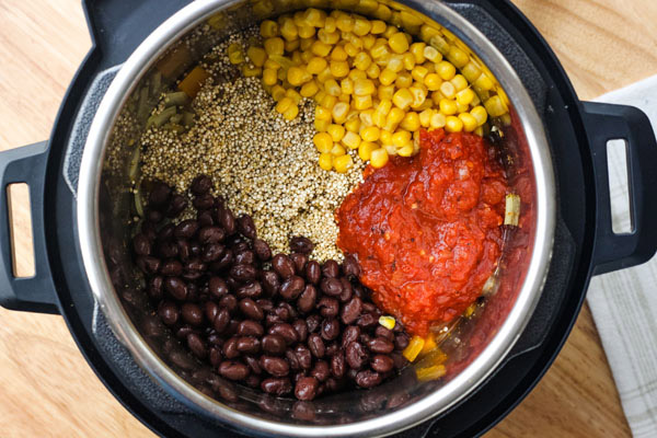 Black beans, corn, salsa, and quinoa inside a 3 quart instant pot.