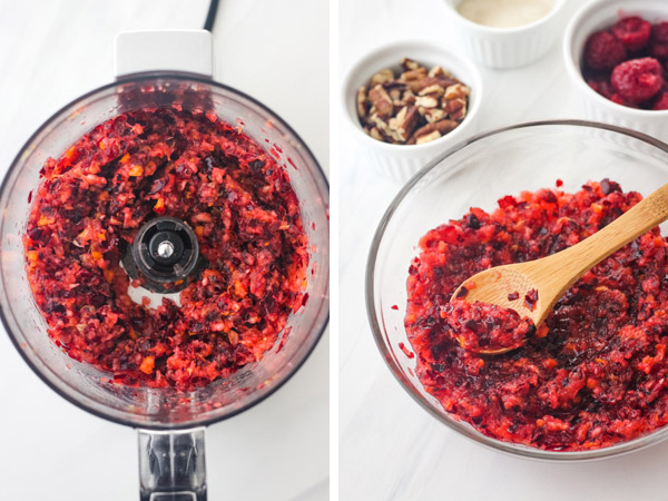 Chopped cranberry and orange in a mini food processor and in a small glass bowl with a wooden spoon.