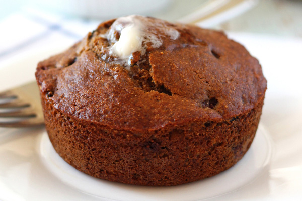 Butter melting on the top of a warm banana bread.