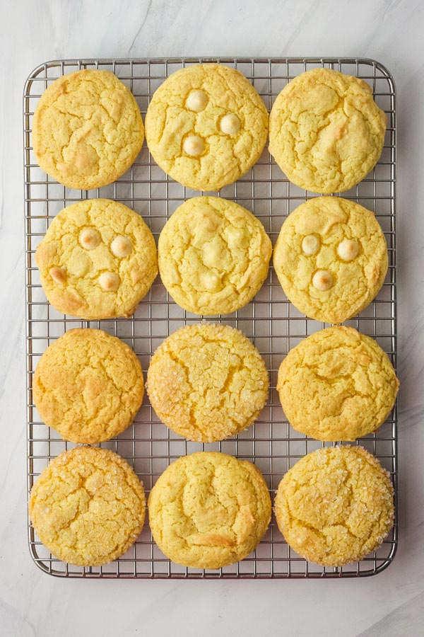 A dozen cookies cooling on a wire rack.