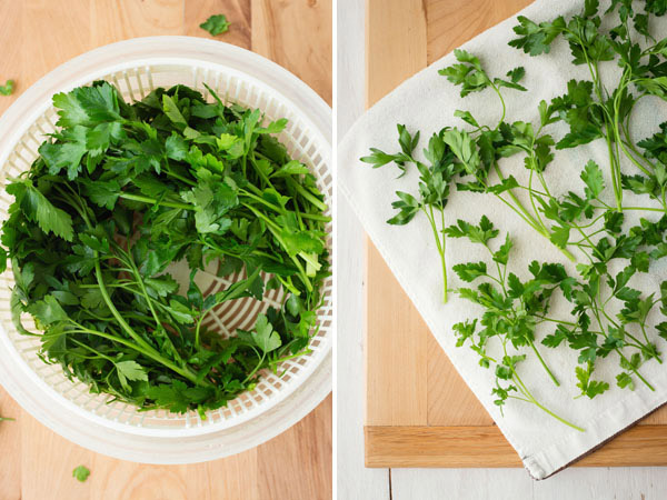 First Photo: Fresh herbs in a salad spinner. Second Photo: Herbs drying on a white dish towel.