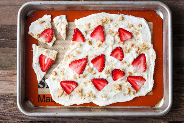 Greek yogurt bark frozen and broken into pieces.