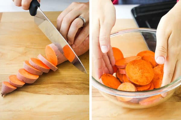 Hand slicing sweet potato into rounds and tossing with oil in a bowl.