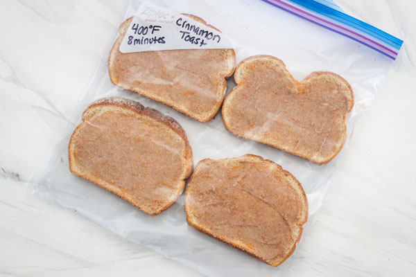 Frozen cinnamon toast slices in a large plastic bag.