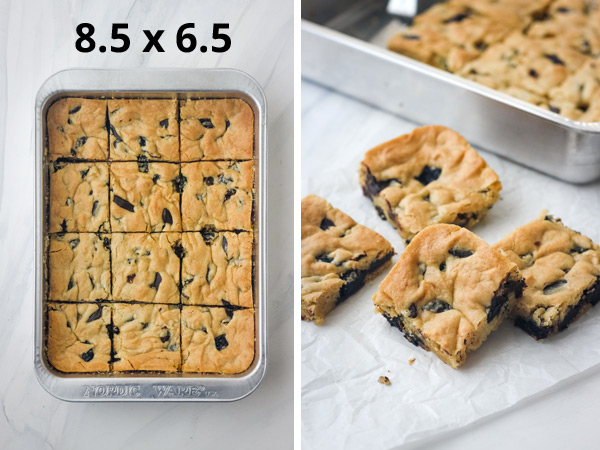 A toaster oven pan next to small cookie bars on a piece of parchment.