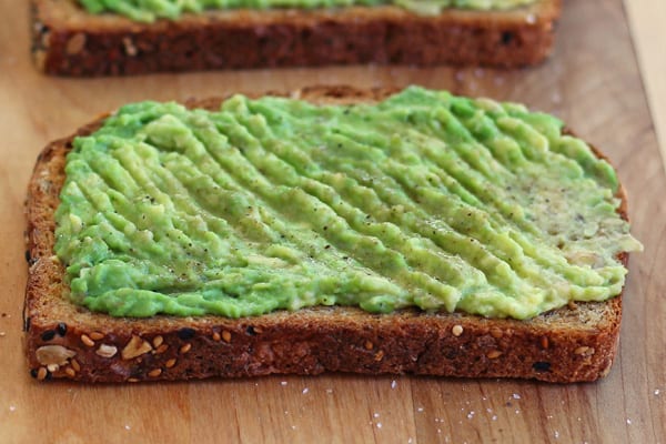 Mashed avocado on toasted bread.