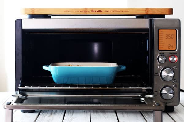 A small blue casserole dish inside a Breville Smart Oven Pro.