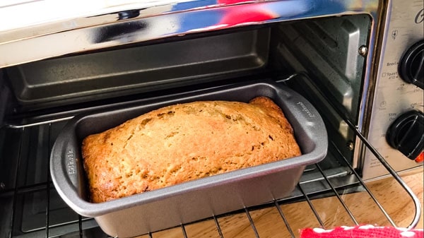 Mini loaf pan inside a toaster oven.