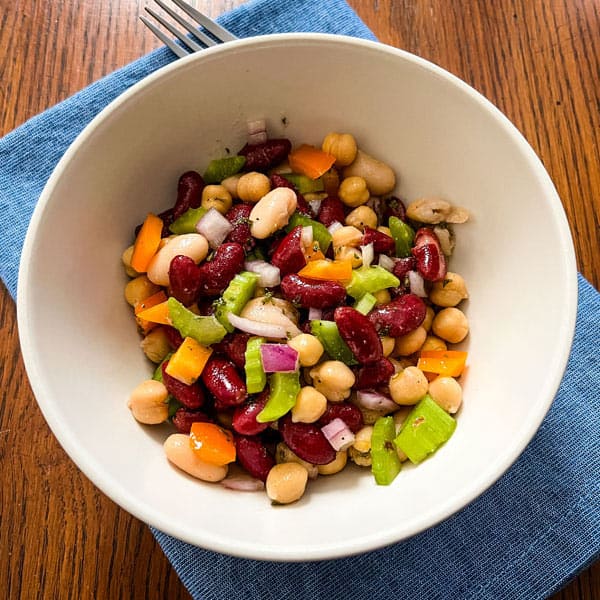 Overhead view of bean salad in a small bowl.