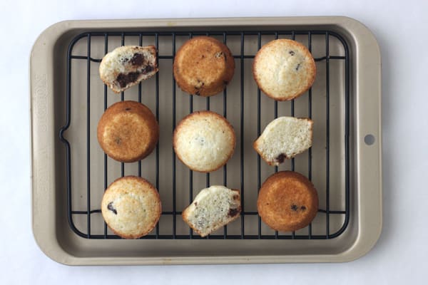 Mini muffins on a cooling rack.