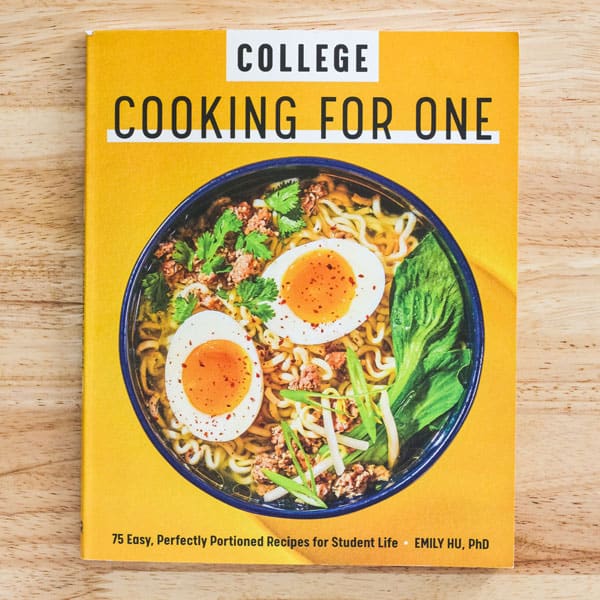 Cookbook on a wooden table.