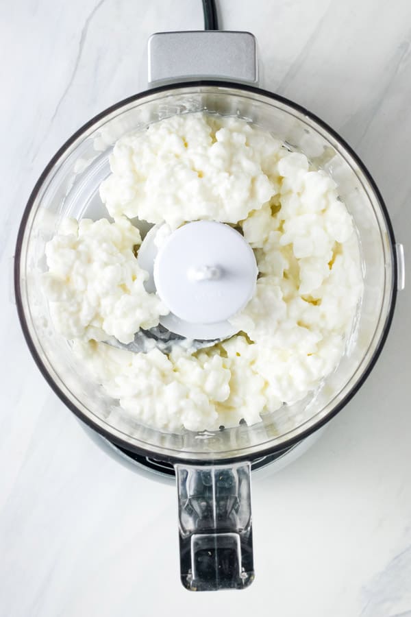 Chunky cottage cheese in a mini food processor.