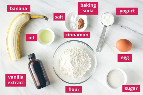 banana bread ingredients displayed on table with labels.