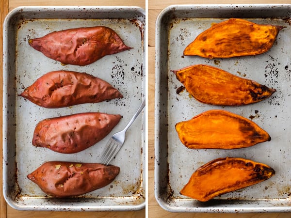 Baked sweet potato halves on a baking sheet.