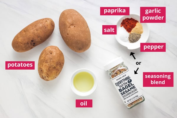 Potato, oil, and seasonings, arranged on a table with labels.