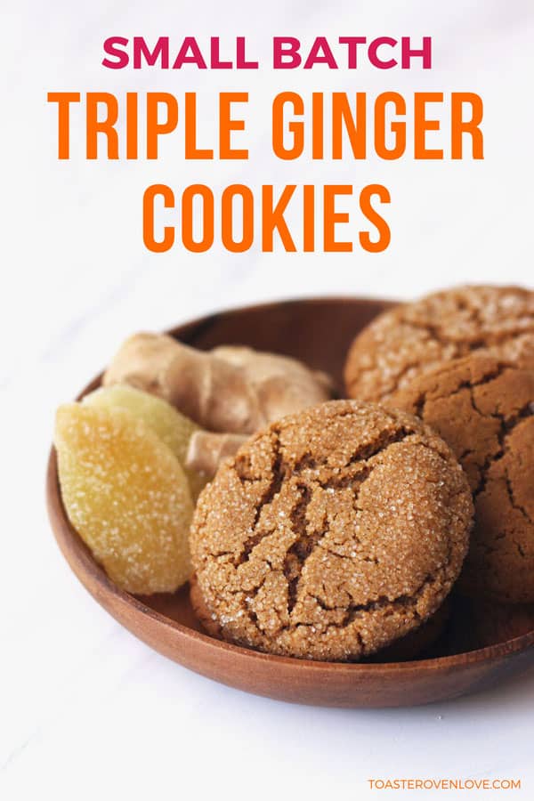 Triple ginger cookies in a wooden bowl with fresh and candied ginger.