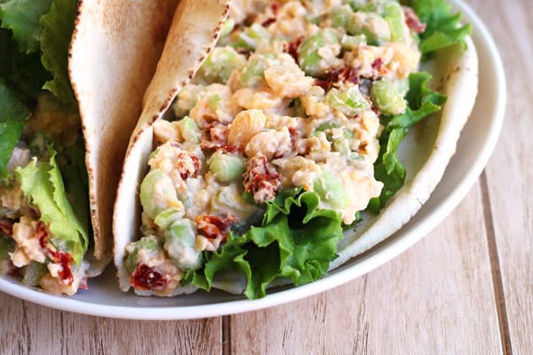 Closeup of chickpea salad stuffed in a pita.